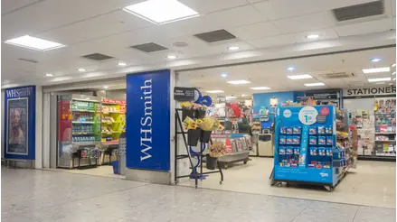 Heathrow Terminal 3 airport pickup meeting point in front of WH Smith